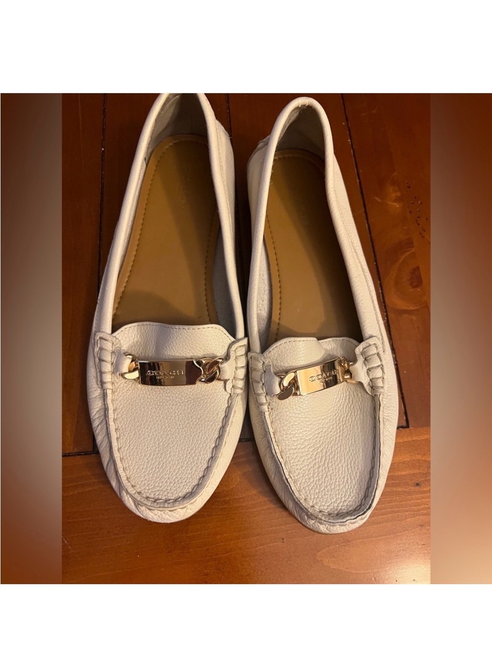 Coach Women’s Size 9 Chalk White Leather Moccasin Loafers with Gold Logo Plaque